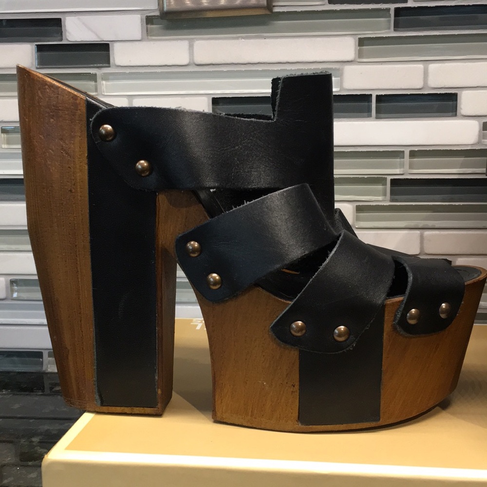 Steve Madden wood and leather platform sandal.
